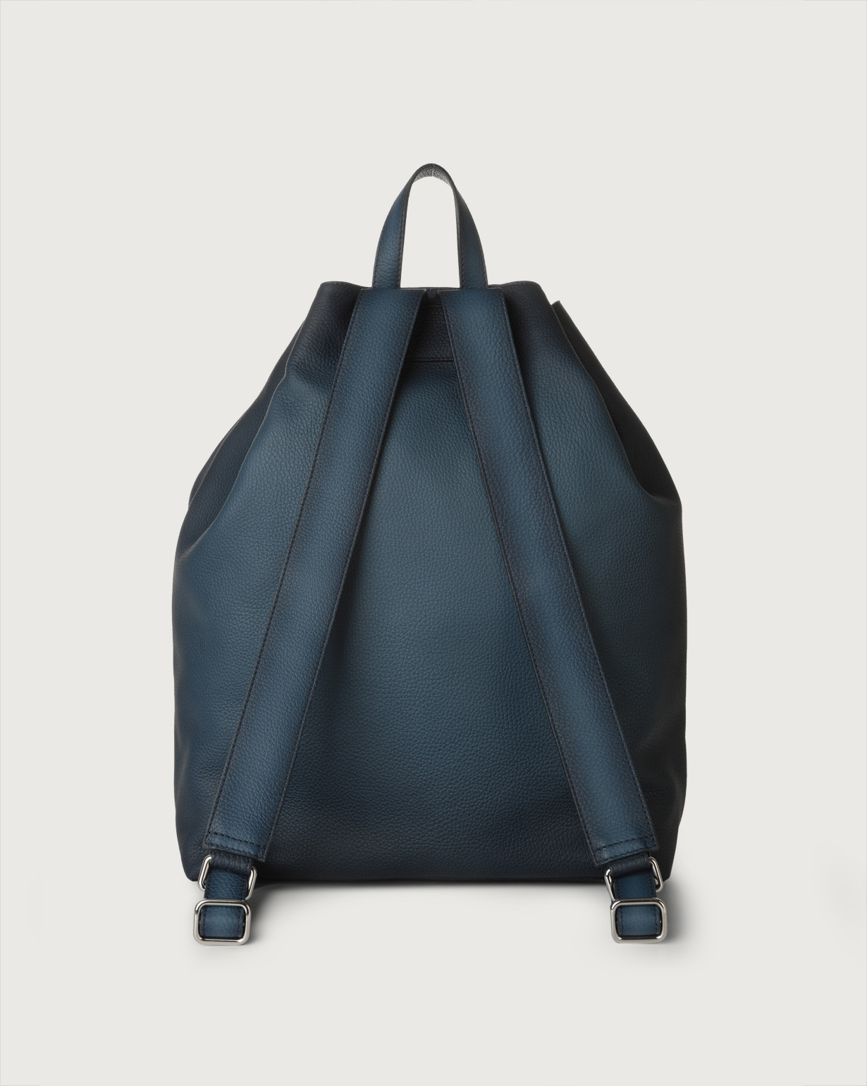 blue leather drawstring backpack Carrie Handcrafted with soft Italian Napa leather this multiway drawstring backpack is also a leather tote and shoulder bag. Small Drawstring Woven Leather Backpack