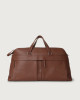 Orciani Micron leather duffle bag with shoulder strap Grained leather Cognac